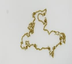 4.4 dwt, 6.8 grams, 18KT